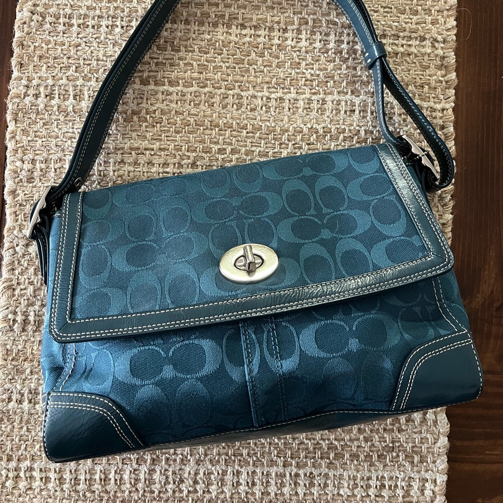 Coach Blue Jacquard Shoulder Bag with Turnlock Closure.